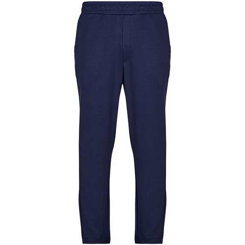 Fila JOVENCAN SLIM CROPPED SMART SWEATPANTS Tamno plava Slike