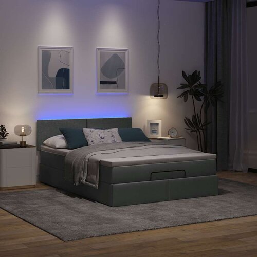 VidaXL Otomanska postelja z vzmetnico siv 140x190 cm blago Slike