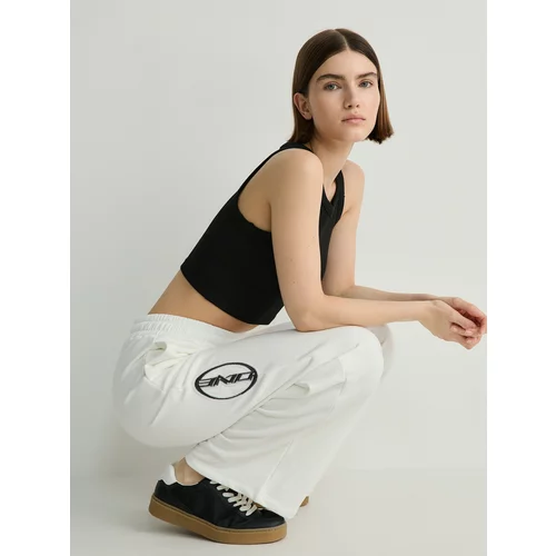 Reserved - Sportske hlače s printom - bijela