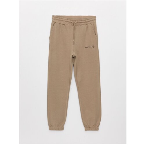 LC Waikiki Women&amp;#039;s Straight Jogger Sweatpants with Elastic Waist. Slike