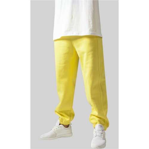 UC Men Yellow sweatpants Cene