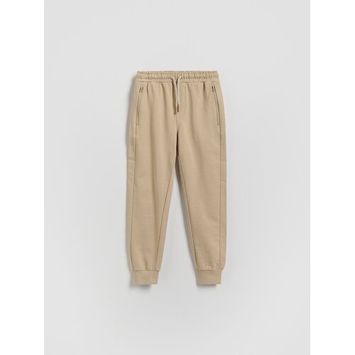 Reserved Pamučne jogger hlače - bež Cene