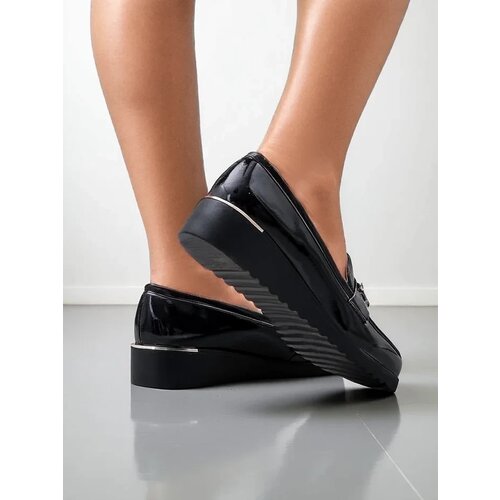 Resti Women's moccasins on a low wedge Leffo Cene