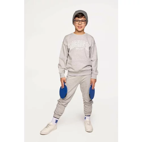 Coccodrillo Otroški bombažen pulover siva barva