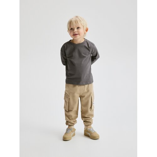Reserved Pamučne jogger hlače - bež Cene