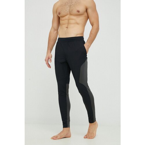 Under Armour Hlače za trening Unstoppable Hybrid boja: crna Slike