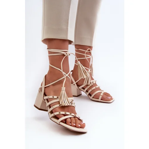 Kesi Beige low-heeled Chrisele studded sandals