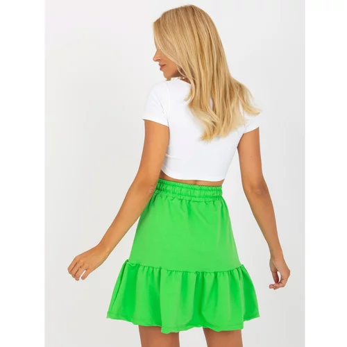 Fashion Hunters Light green short sweatshirt skirt with a tie detail