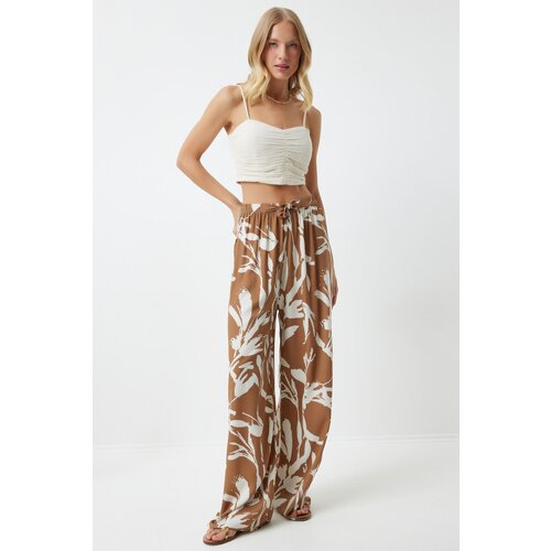 Happiness İstanbul Women's Biscuit White Patterned Loose Viscose Palazzo Trousers Cene