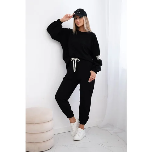 Kesi Cotton sweatshirt with a longer back + black trousers