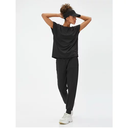 Koton Basic Sports T-Shirt with a Relax Fit Stitching Detail.