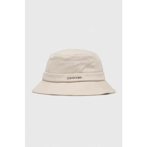Calvin Klein Bombažni klobuk bež barva