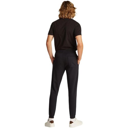 Tommy Hilfiger Hlače TJM SLIM S FLAG SWEA DM0DM20473 Črna Slike