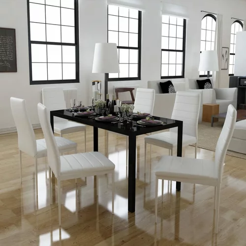 In sedem delni komplet jedilne mize in stolov črne bele barve