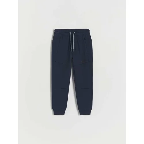 Reserved športne hlače jogger z detajlom zadrge - mornarsko modra