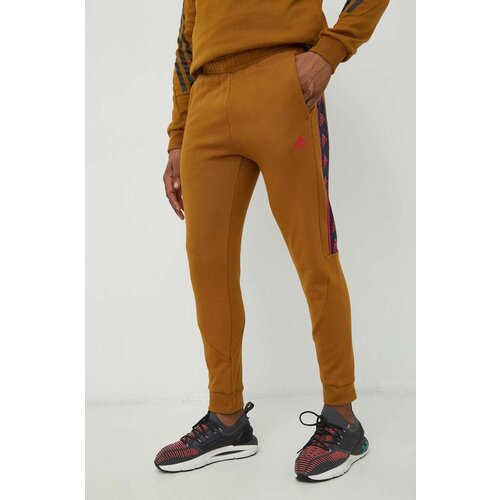 Adidas Pamučni donji dio trenirke za mu&amp;scaron;karce, boja: smeđa, s tiskom Slike