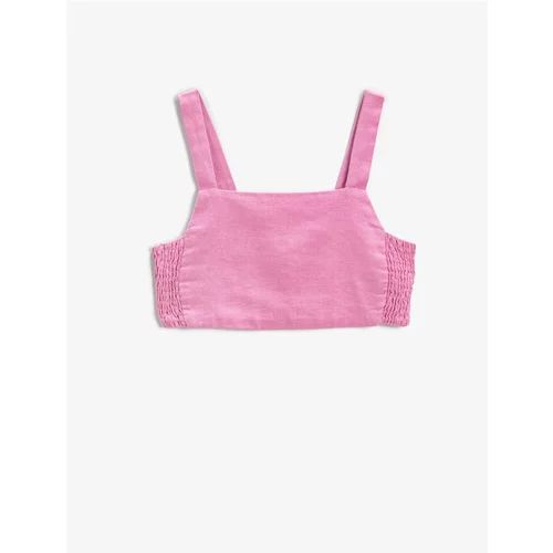 Koton A crop top with thick straps and a window detail in the back with elastication.