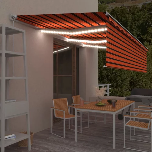 vidaXL Ročno zložljiva tenda s senčilom LED 6x3 m oranžna in rjava