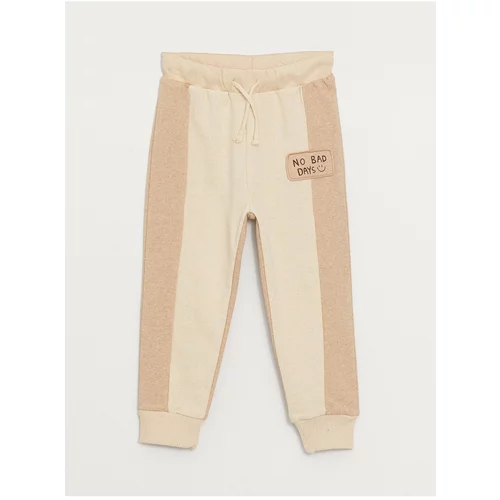 LC Waikiki Baby Boy Tracksuit Bottoms with an Elastic Printed Waist.