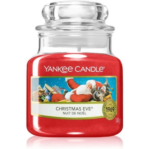Yankee Candle Christmas Eve dišeča sveča Classic srednja 104 g