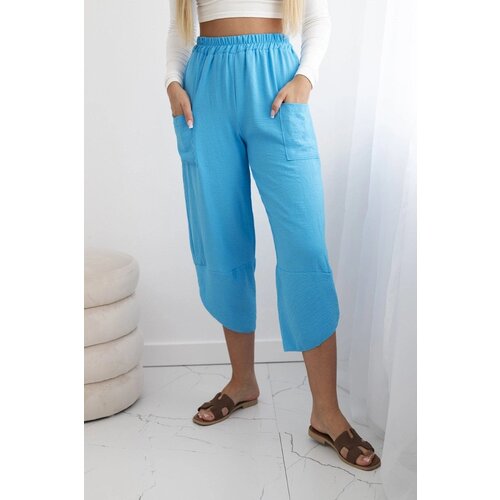 Kesi Turquoise trousers with wide legs and pockets Slike