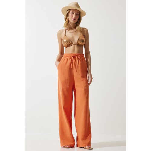  women's orange muslin palazzo trousers Cene