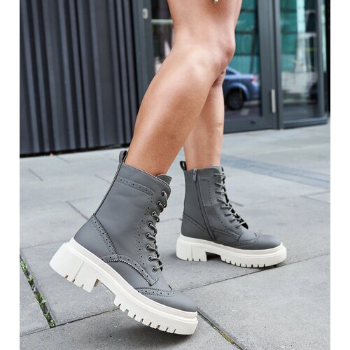 Gemre Green boots adorned with stitching Nicla Cene