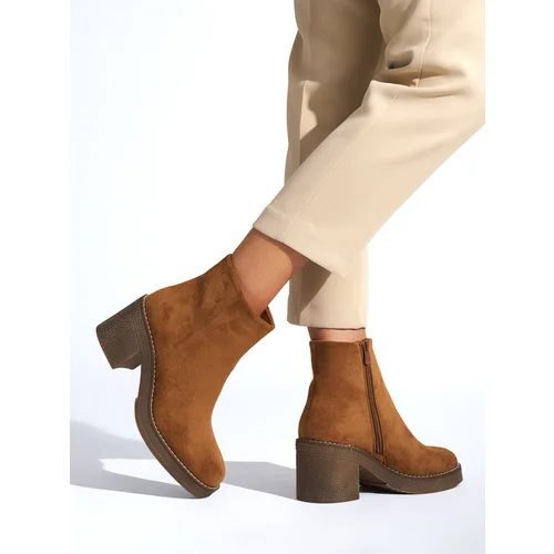 Shelvt Brown women's ankle boots on a heel