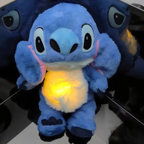 Pli&amp;scaron;ani Stitch koji di&amp;scaron;e i svetli - nežni saputnik za san Slike