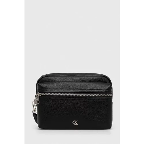 Calvin Klein Jeans Usnjena kozmetična torbica črna barva