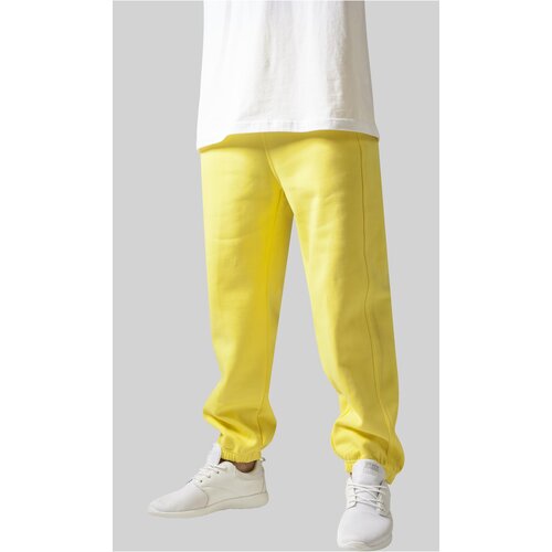 UC Men Yellow sweatpants Cijene