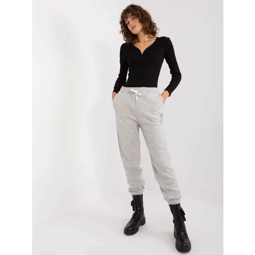 Fashion Hunters Light grey sweatpants with SUBLEVEL print