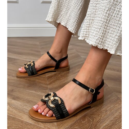 D/CEO Black flat sandals with a gold ornament Melona Slike