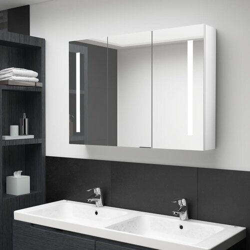 vidaXL LED kopalniška omarica z ogledalom 89x14x62 cm sijoče bela Cene