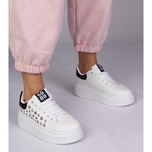  White sneakers with black detail and studs Urlana Slike
