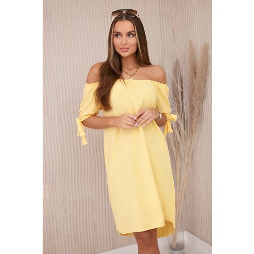 Kesi Dress with a longer back and ties on the sleeves yellow Slike