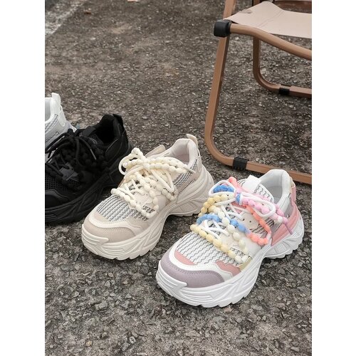 Resti Women's sporty sneakers on a thicker sole Loness Cene