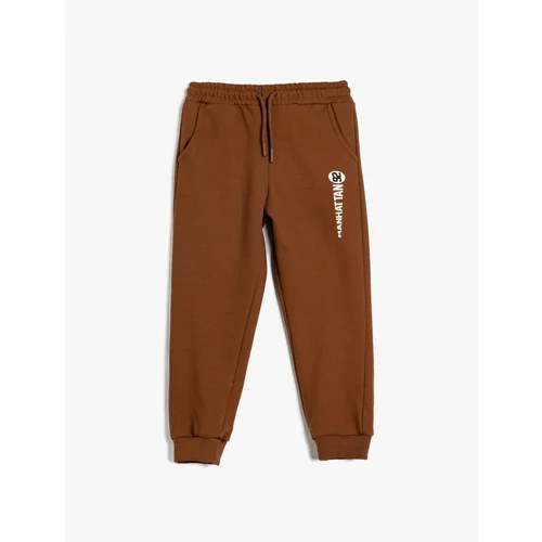 Koton Tracksuit Bottoms with Tied Waist and College Printed Pocket Detail