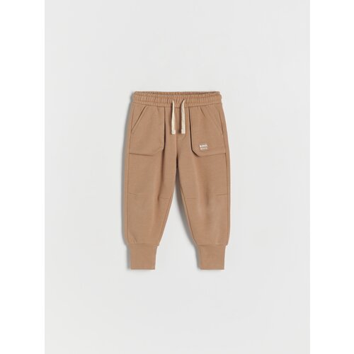 Reserved joggers hlače - rjava Slike