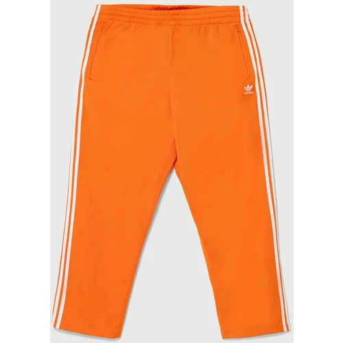 Adidas Spodnji del trenirke oranžna barva, IR9894