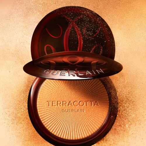 Guerlain Terracotta Luminizer posvetlitveni bronz puder odtenek 00 Cool Ivory 7 g Slike