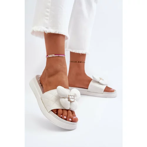 Kesi White Cedrella women's slippers with low platform embellishment