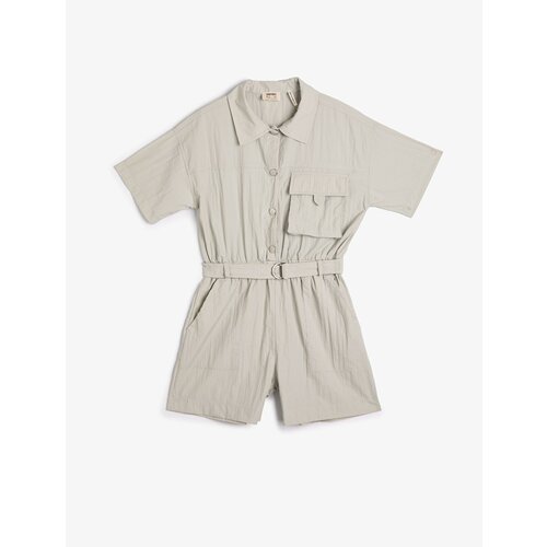 Koton Jumpsuit with Short Sleeves, Shirt Collar with Belt, Pockets and Snaps with Snap Buttons. Cene