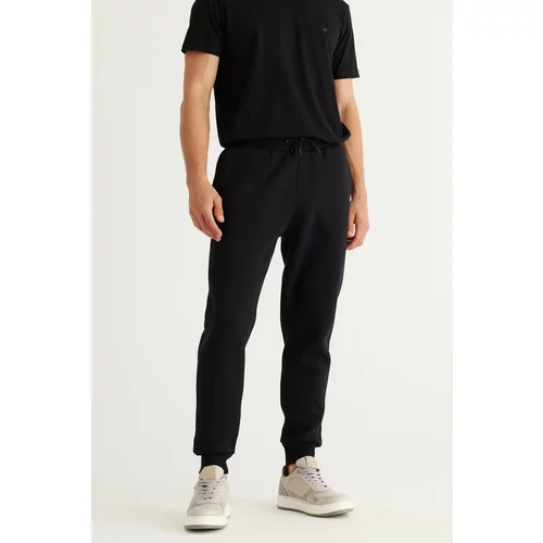 AC&Co / Altınyıldız Classics Men's Black Standard Fit Regular Cut 3 Thread Yarn Inner Fleece Cotton Comfortable Sweatpants.