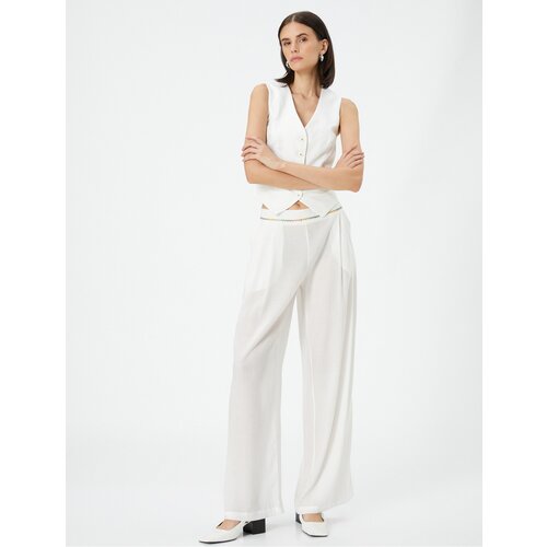 Koton Palazzo Trousers Loose Fit, Normal Waist, Pockets with Embroidery Detail. Slike