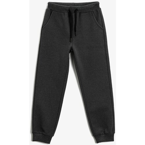 Koton Sweatpants - Black - Straight Cene
