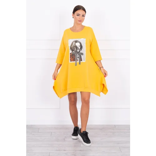 Kesi Dress with print and flowing bottom of mustard