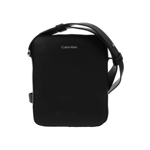 Calvin Klein Jeans Torbe za čez ramo Minimalism Reporter Črna