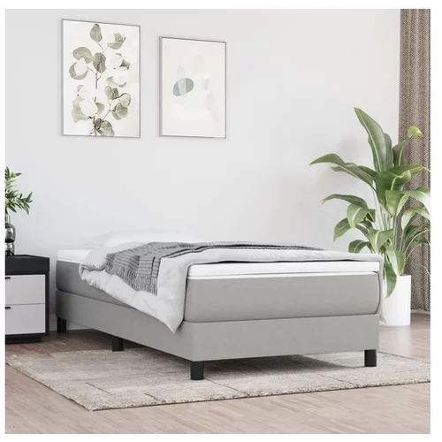  Box spring posteljni okvir svetlo siv 90x200 cm blago