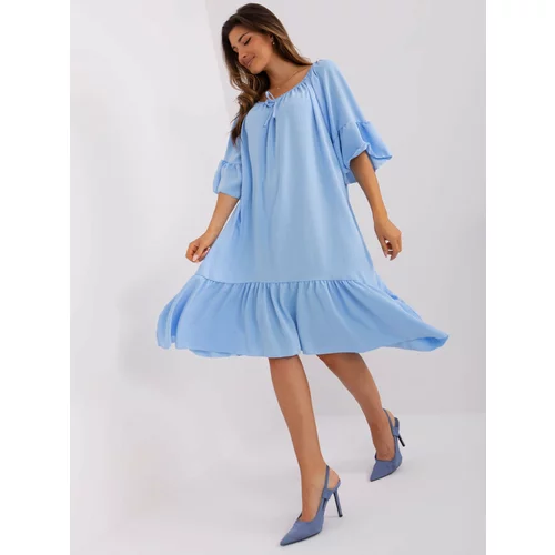 Fashion Hunters Light blue dress with a loose cut ruffle
